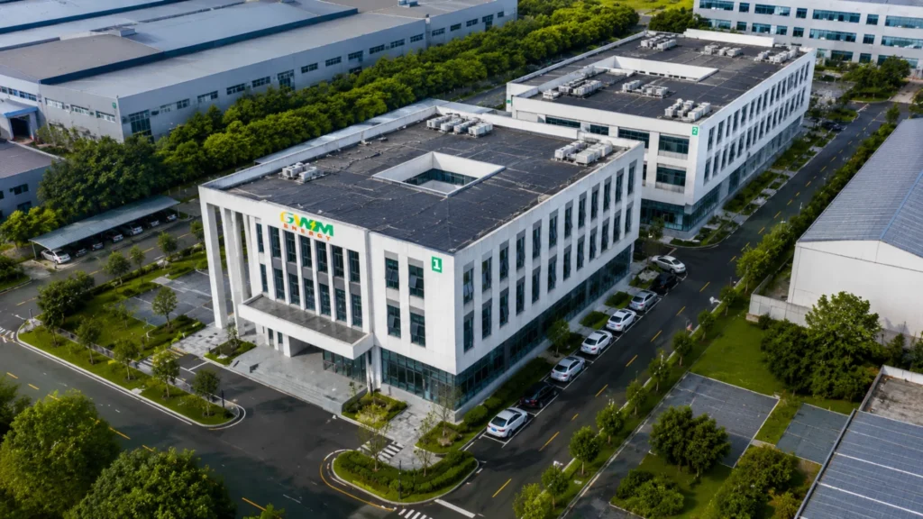 Aerial view of the GWM Energy headquarters and advanced lithium battery manufacturing facility with modern production buildings and sustainable infrastructure.